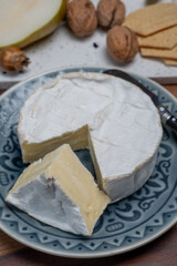 French soft Camembert cheese, original Camembert de Normandie, with white mold