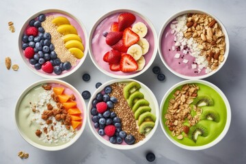 Vibrant vegan smoothie bowls topped with fresh fruits and granola, shot from above.