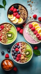 Assorted vegan smoothie bowls with granola, berries, and banana slices, turquoise backdrop