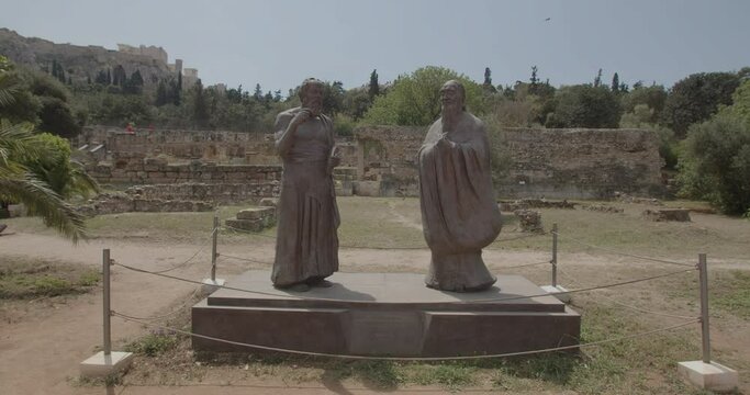 Socrates and Confucius statues