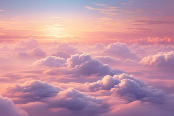 Beautiful pink sunset sky above clouds with nice dramatic light	
