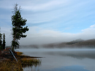 Fototapeta na wymiar Idaho mountain lake morning fog