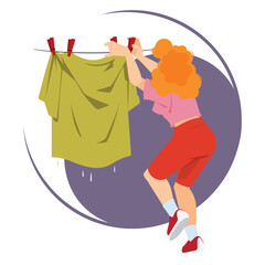 Woman housewife hangs washed laundry.