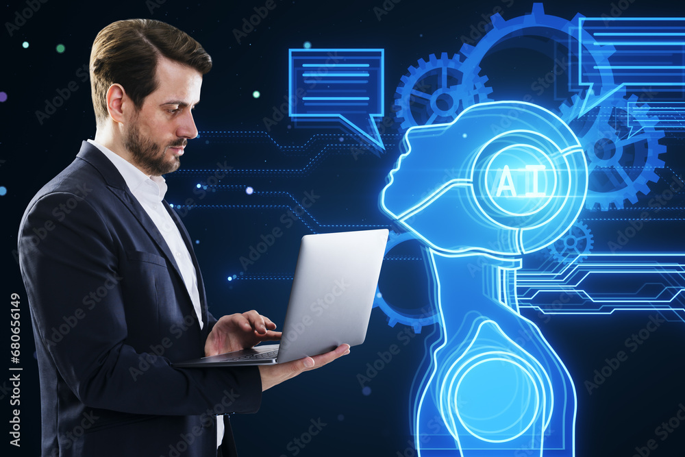 Poster attractive young european businessman using laptop with glowing robot head and icons on dark blurry 