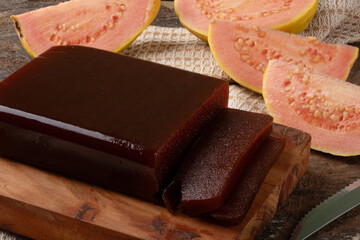 Delicious guava paste on cutting board.