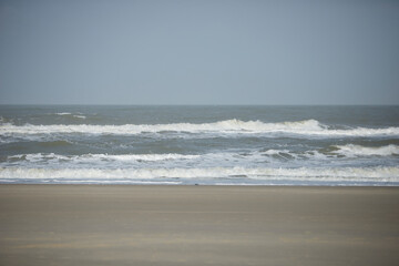 Waves of the North Sea on the beach