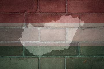 map and flag of hungary on a old brick wall
