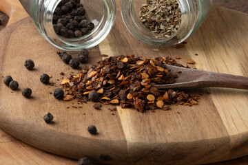Seasonings spread on cutting board.