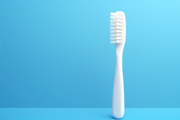 White toothbrush on a blue background. Copy space background. AI generative.