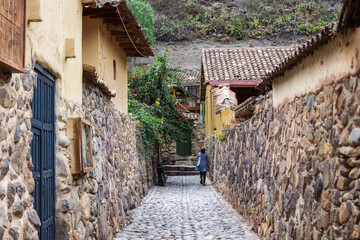 A narrow stone street in Ollantaytambo, Peru