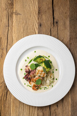 Grilled seafood with broccoli and sauce