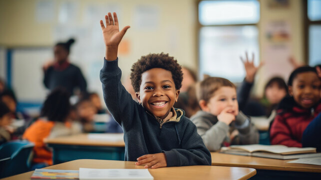  A Smiling African-American Boy Actively Participating in a Classroom Lesson