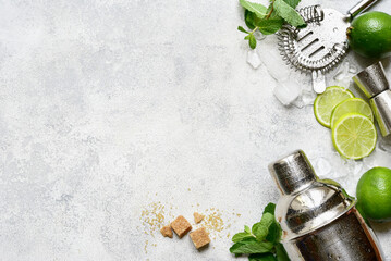 Ingredients for making mojito - delicious lime cocktail with mint. Top view with copy space. - obrazy, fototapety, plakaty