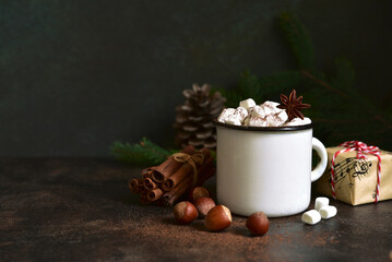 Christmas hot chocolate with marshmallow in a white mug.