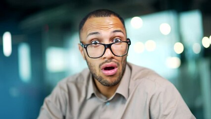 Wonder employee entrepreneur man looks at canera read unbelievable astonish news excited guy male Shocked with mobile phone receive smartphone sms amazed say wow shock amazement at business office