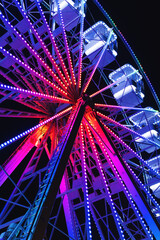 Ferris wheel also known as giant observation wheel, popular entertaining ride in amusement park,...