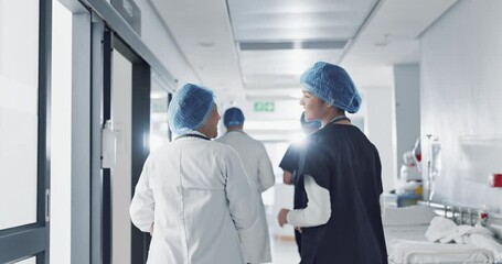 Discussion, hospital and doctors walking for teamwork, collaboration and advice for diagnosis. Healthcare, meeting and health workers in corridor for results, medical research and patient report - Powered by Adobe