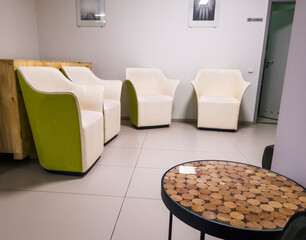 Empty modern waiting room with cozy and comfortable furniture. Interior