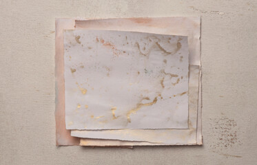Beige and nacre Gold  frame painting paper empty card on wood wall. Abstract texture copy space neutral grunge background.