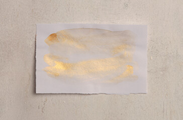 Beige and nacre Gold  frame painting paper empty card on wood wall. Abstract texture copy space...
