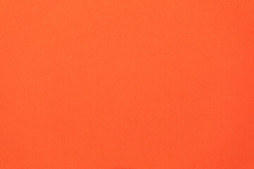 Detail of red colour paper sheet (school poster board, bristol board) texture. Plain background