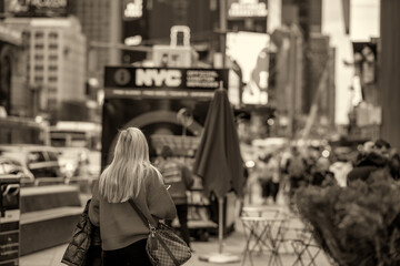 Back view of crowd in Times Square, New York City - obrazy, fototapety, plakaty