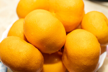 Close up view of a pile of a mandarins