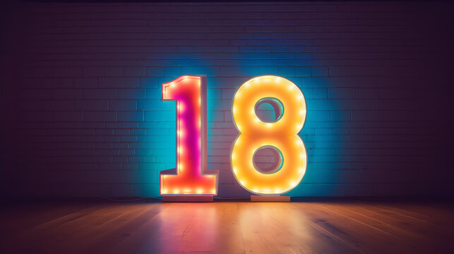 The number 18 made out of colorful neons in front of a wall