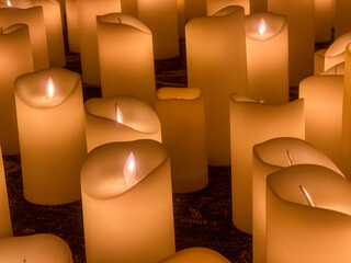 Calgary, Alberta - October 11, 2023: A field of candles of assorted heights
