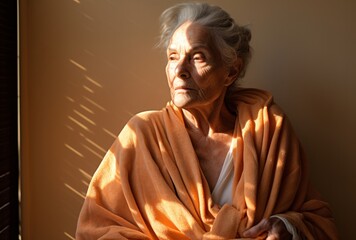 elderly woman in bathrobe holding tissue on, solarizing master, light orange and gray, candid - obrazy, fototapety, plakaty