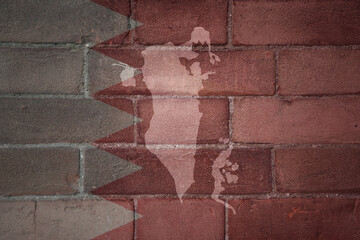map and flag of bahrain on a old brick wall