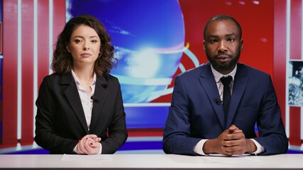 Diverse journalists hosting morning show to address all news topics live on global network,...