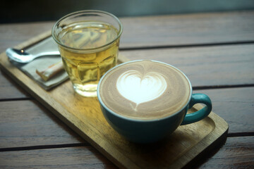 cup of hot latte art coffee