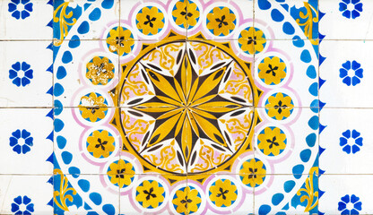 Traditional tiles with blue and yellow floral ornaments in high resolution from Porto, Portugal 