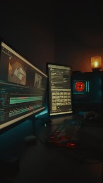 Brightly Lit Empty Interior with Illuminated Screen people working in computer video editing