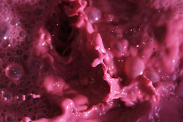 Pink liquid splash as background