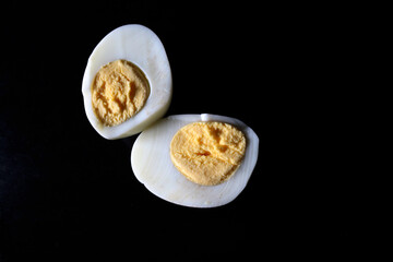 Photo of cooked boiled chicken eggs on the kitchen table ready to be served for breakfast or dinner