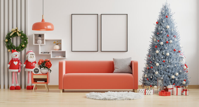 Poster frame mockup in christmas room style living room interior with red sofa on empty white wall