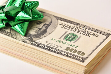Paper money dollar banknotes and bow