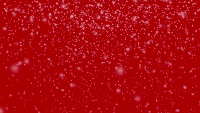 Strong wind and heavy snow falling in red background. Snow falling on red background. 
