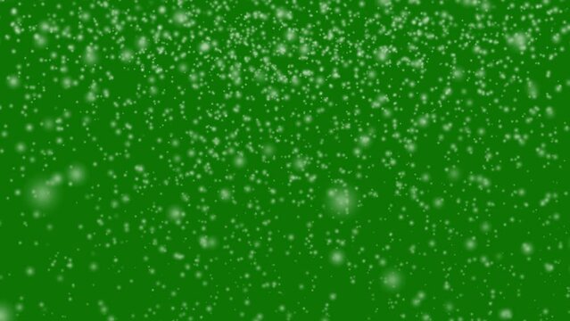 Isolated falling snow on green screen. 
