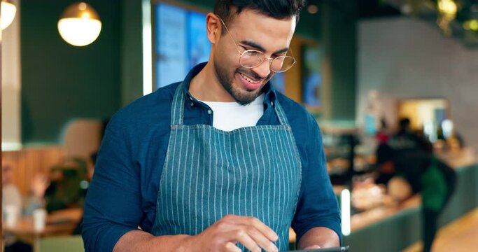 Happy man, barista and tablet for cafe or restaurant marketing, online management or customer service reviews. Happy business owner, waiter or worker typing on digital technology for coffee shop data