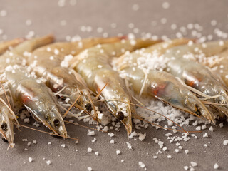 Raw shrimp sprinkled with salt