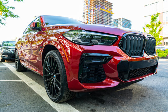 New York City, USA - May 10, 2023: 2020 BMW X6 M Competition suv car red color, low corner view