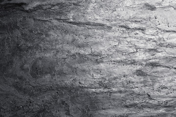 Texture of grey stone surface as background, closeup