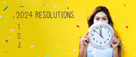 2024 Resolutions with young woman holding a clock showing nearly 12
