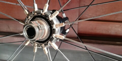 Bicycle repair and replacement concept background of rear bike wheel. Broken parts close-up