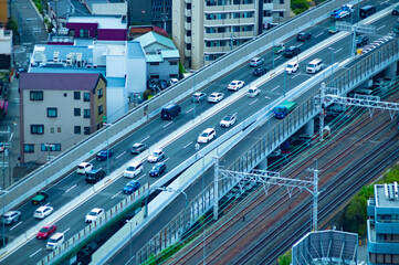 A traffic jam on the highway in Osaka by high angle view telephoto shot