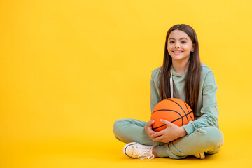 Teen girl excelling in basketball. teen girl basketball player. Passionate about basketball sport....