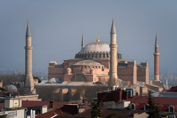 Fototapeta na wymiar View of the Hagia Sophia Grand Mosque from the roof of the house on a sunny day, Istanbul, Turkey